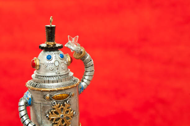 istock Cute Little Toy Robot on Red Background 164974493