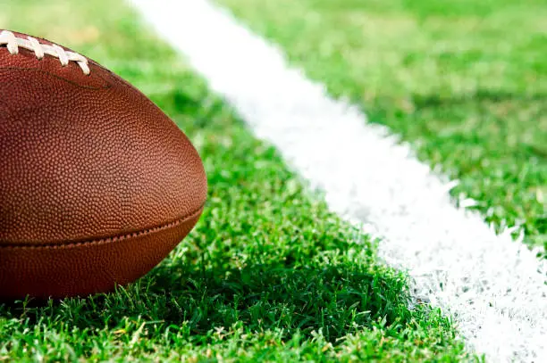 American Football - First and goal - Close up of football inches from the goal line