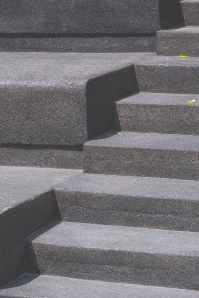 istock black exposed aggregate finish cobblestone staircase of outdoor stage in vertical frame 1649761957