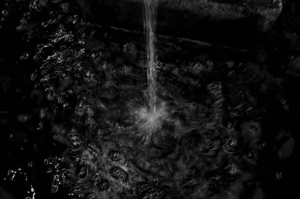 Water fountain in motion blur and black and white