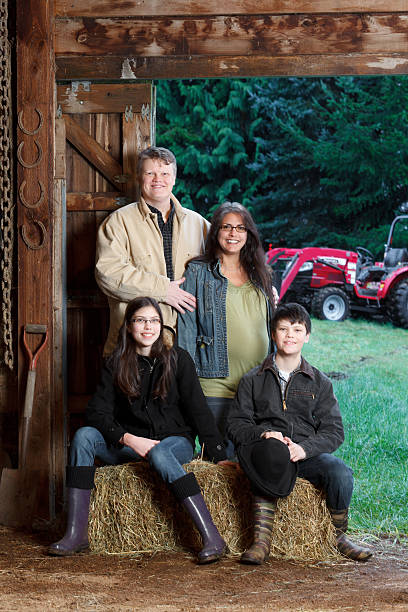 istock Rural family portrait in a barn. 164979629