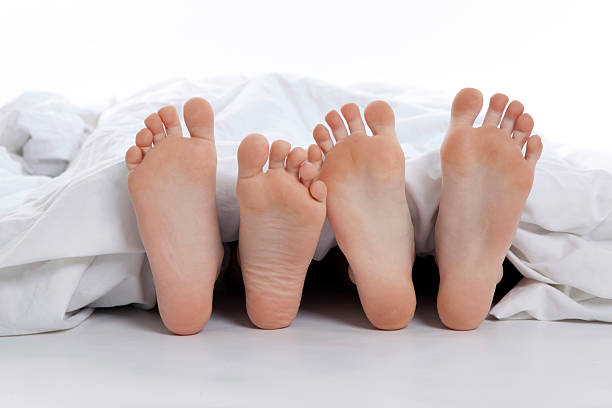 couple's feet stock photo