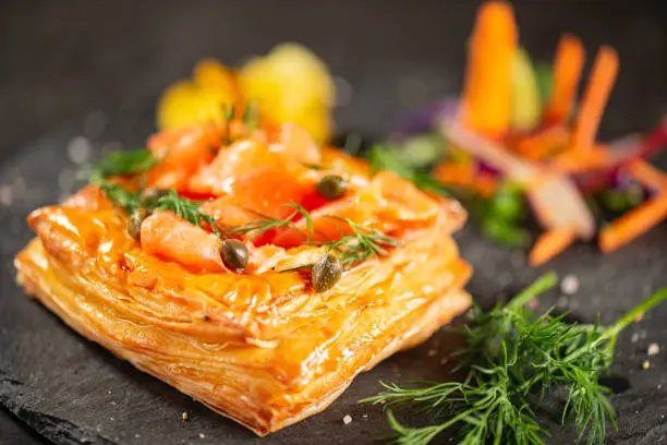 Golden baked homemade Danish pastry with cream cheese, smoked salmon, baby capers and fresh dill.