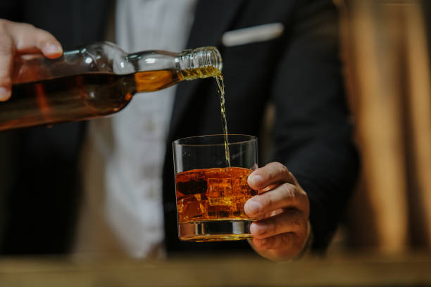 Whiskey Businessman Whiskey . glass of bourbon stock pictures, royalty-free photos & images