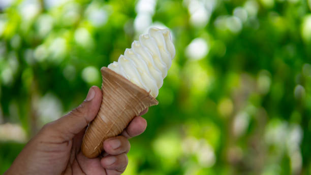 istock Close up hand holding icecream 1649901744