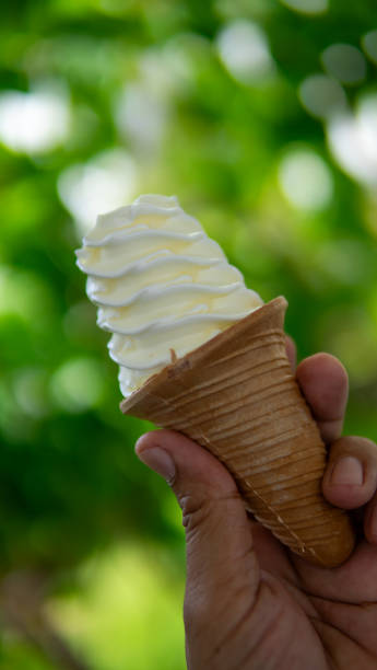 istock Close up hand holding icecream 1649901745