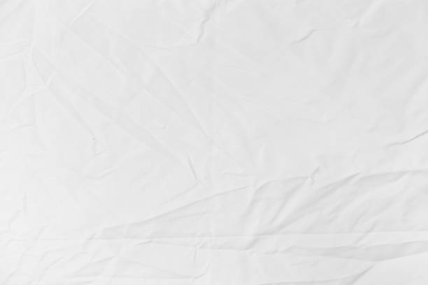 istock close up crumpled white textile texture background for template design concept 1649924298