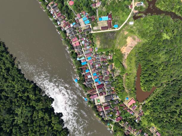 istock Settlements by the river in the forest 1649958045