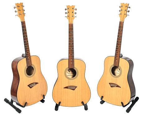 acoustic guitar on stand with clipping path isolated