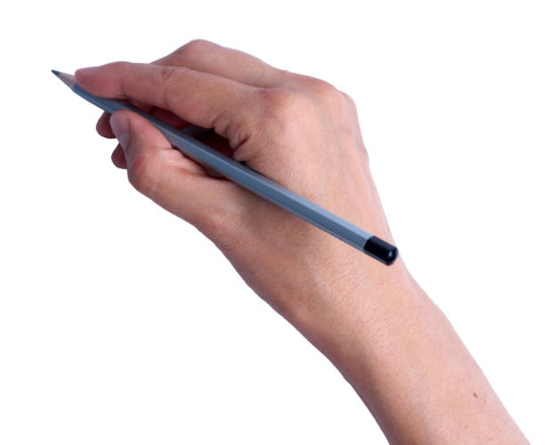 istock Woman's hand holding a pencil. Isolated on white background with clipping path 1650100833