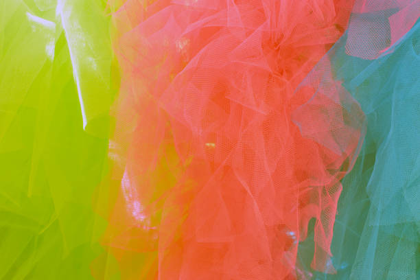 Vibrant Textured Net Fabric: A net fabric with lively colors and varied textures, perfect for adding beauty to backgrounds with its different patterns.