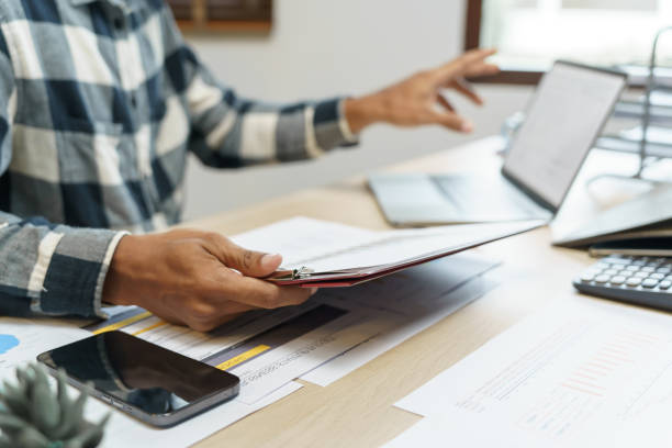 istock Attractive confident Hispanic Business man using laptop computer and professional working investor start up project business planning in office 1650117972