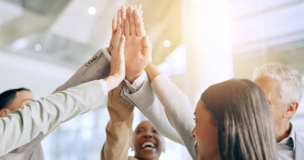 istock Business people, success and high five for collaboration, teamwork support or goals and celebration. Team building circle, job motivation and group of men and women with hands together for mission 1650119163