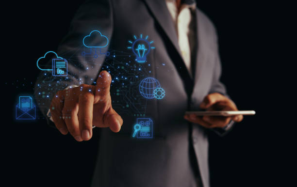 istock Business people use the internet to network and search information on their mobile devices using artificial intelligence. Technology concepts include storing large data warehouses on cloud computing. 1650122225