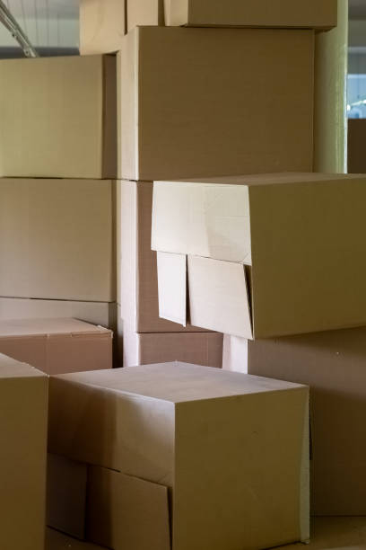 istock a warehouse full of cardboard boxes 1650125479