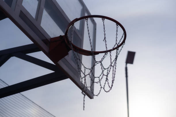 istock Basketball hoop on a blue sky 1650167160