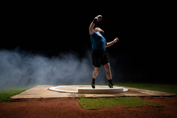istock Male athlete throwing shot put ball 1650168400
