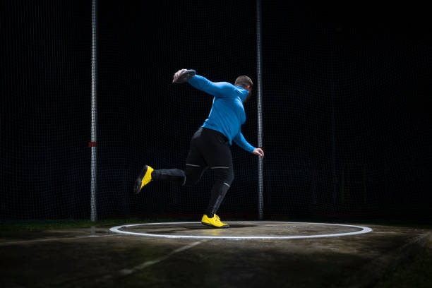 istock Male athlete holding discus 1650168417