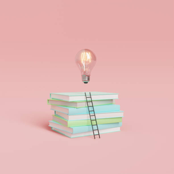 istock Stack of books with light bulb and ladder against pink background 1650168547
