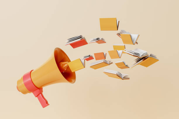 istock Megaphone with books against yellow backdrop 1650168548