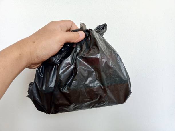 istock Photo with hands holding a plastic bag 1650175591