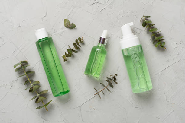 istock Herbal face care products on concrete background, top view 1650204633