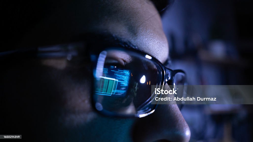 Glaases Software Developer Software Engineer With Glasses Working At Midnight Stock Photo ...