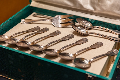 Antique spoon cutlery in a box