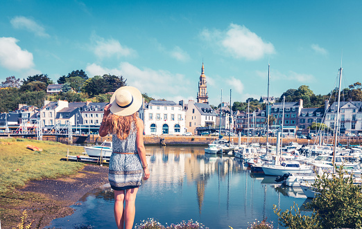 Woman traveling in France- Saint Brieuc city and port- Travel destination in Brittany