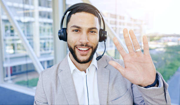 istock Thinking face, man and call center for video in customer service, support or conversation in office. Portrait, listen and business person telemarketing, communication or idea for crm with headphones 1650303674