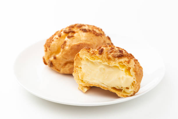 istock Tasty cream puffs on a white background. 1650313398