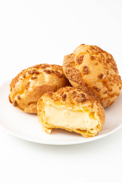 istock Tasty cream puffs on a white background. 1650319316