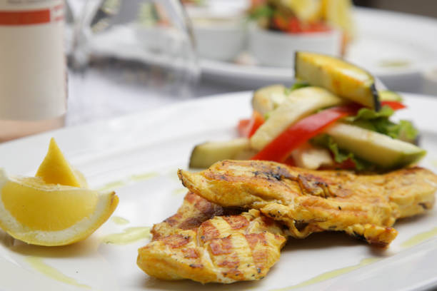 istock Grilled chicken with grilled vegetables served on the restaurant table 1650321452