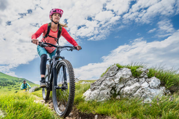 istock Mature women mountain biking 1650330740