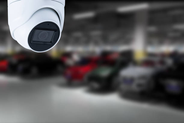istock CCTV Camera Operating in car park building. Copy space. 1650343134
