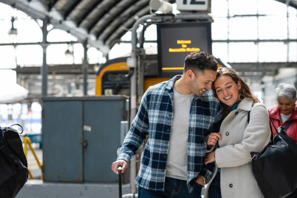 istock Couple Disembarking at Station 1650344174