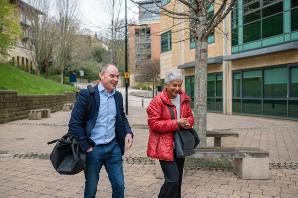 istock Colleagues Walking Down the Street 1650345271