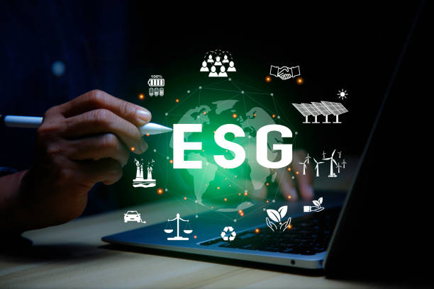 istock Net zero, 2050,ESG concept.Businessman using laptop on virtual screen interface.energy for green environment and energy icons around.Using AI (artificial intelligence) to help reduce global warming 1650368285