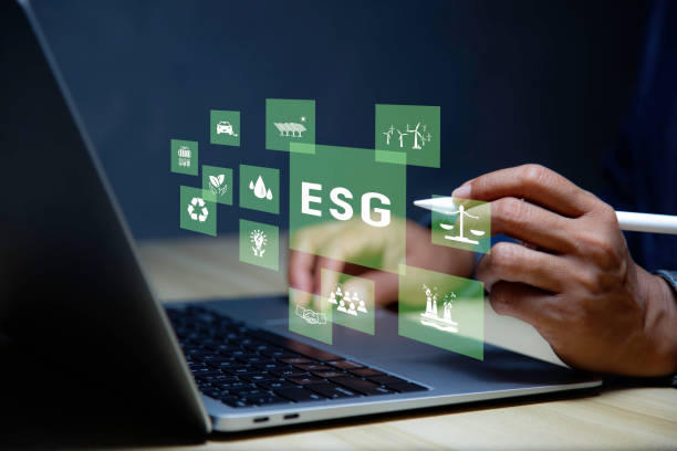 istock Net zero concept. Hand holding bulb with ESG icon. It is surrounded by a clean energy icon. Net zero 2050. Carbon gas affects global warming. Concept with innovation inspiration from big data 1650368380