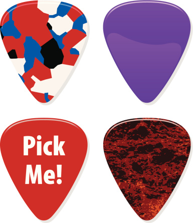 Four guitar picks great for posters, signs, layouts.
