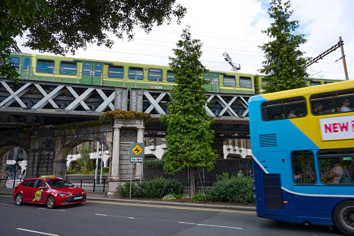 Dublin is a busy city. Infrastructure includes train transportation as well as lots of busses.