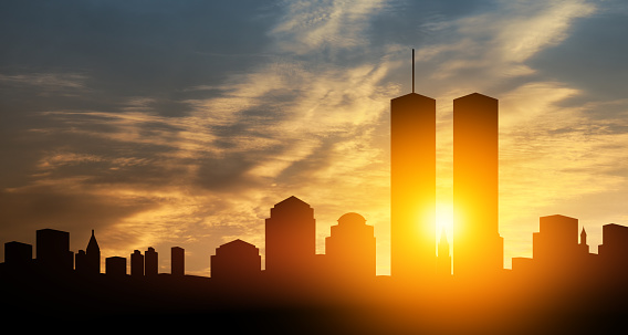 New York skyline silhouette with Twin Towers at sunset. 09.11.2001 American Patriot Day banner.
