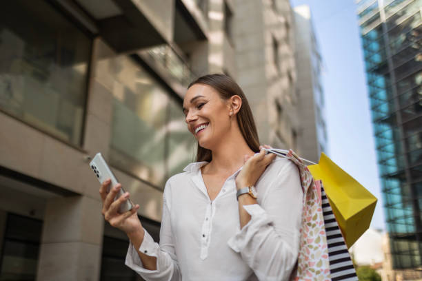 istock Falling for Fashion and Phone 1650470835