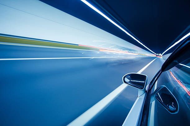 istock Driving at high speed in tunnel 165047128