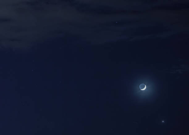 istock Stars glowing on dark blue night sky. Night clear cloudscape with crescent moon and star 1650477699