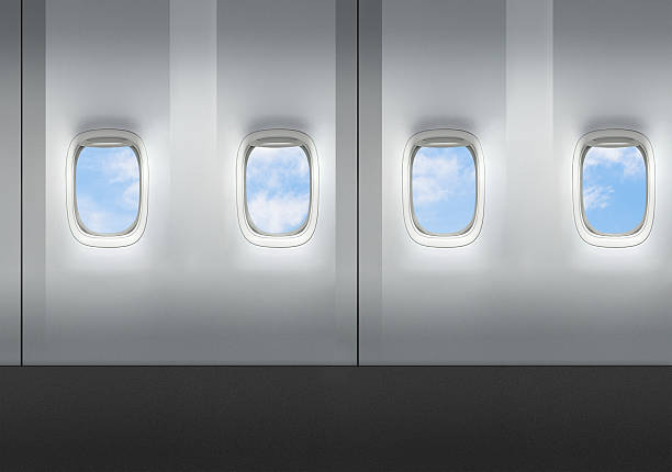 Airplane windows Airplane windows from inside airplane interior stock pictures, royalty-free photos & images