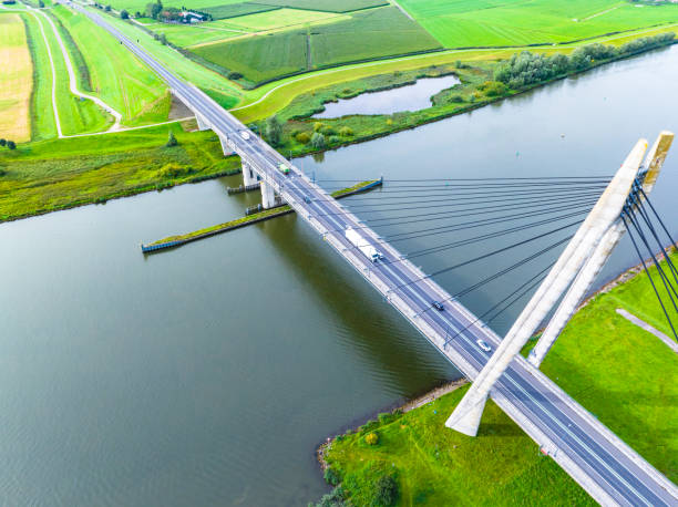 istock Suspension bridge over a river seen from above 1650509181