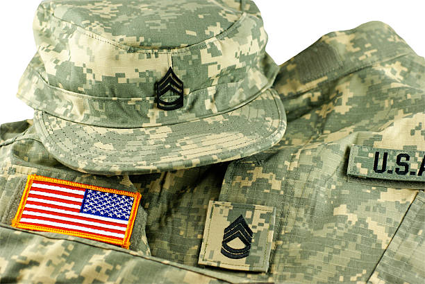 US Army Camouflage Uniform and Cap Isolated on white with clipping path. sergeant badge stock pictures, royalty-free photos & images