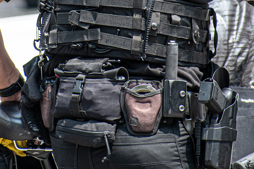 Police department bulletproof vest with ammo pouches.