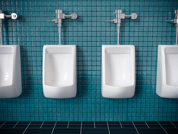 Restroom Four urinals on a blue tiled wall in public restroom. Very high resolution 3D render. mens room stock pictures, royalty-free photos & images